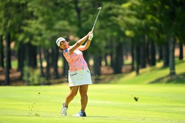 Ai Suzuki of Japan hits her third shot on the 4th hole during the first round of the Ai Miyazato Suntory Ladies Open at Rokko Kokusai Golf Club on...