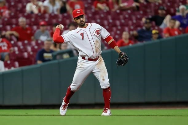 Eugenio Suarez of the Cincinnati Reds throws to second base in the seventh inning against the Milwaukee Brewers at Great American Ball Park on June...