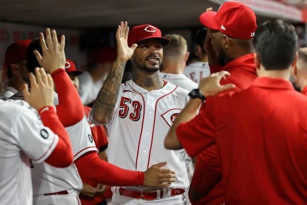 Vladimir Gutierrez of the Cincinnati Reds celebrates with teammates in the seventh inning against the Milwaukee Brewers at Great American Ball Park...