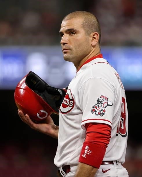 Joey Votto of the Cincinnati Reds looks on in the seventh inning against the Milwaukee Brewers at Great American Ball Park on June 09, 2021 in...