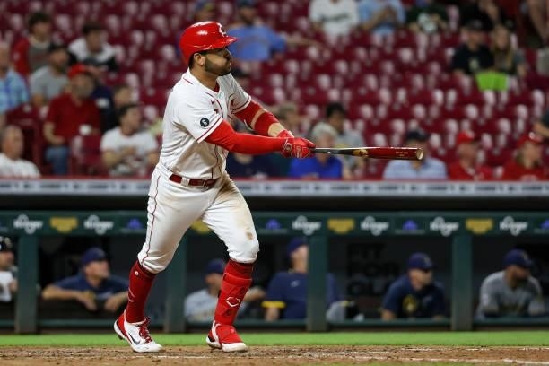 Eugenio Suarez of the Cincinnati Reds hits a single in the seventh inning against the Cincinnati Reds at Great American Ball Park on June 09, 2021 in...