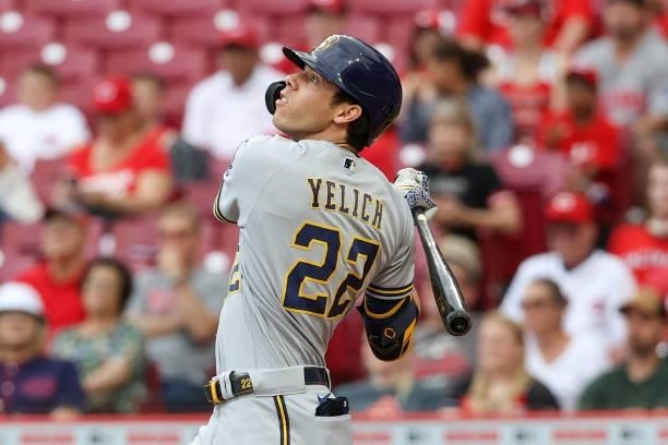 Christian Yelich of the Milwaukee Brewers flies out in the first inning against the Cincinnati Reds at Great American Ball Park on June 09, 2021 in...