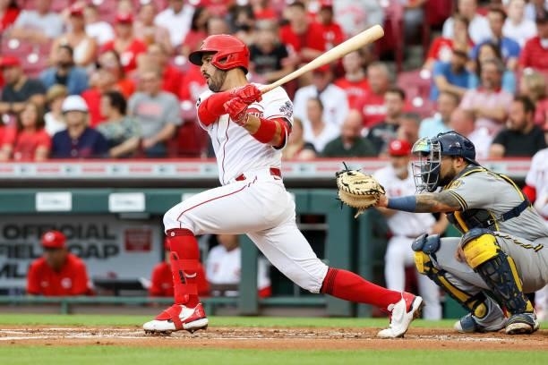 Eugenio Suarez of the Cincinnati Reds grounds out in the first inning against the Milwaukee Brewers at Great American Ball Park on June 09, 2021 in...