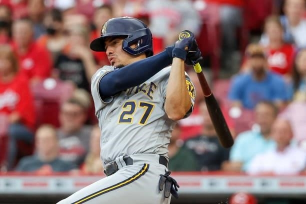 Willy Adames of the Milwaukee Brewers hits a single in the second inning against the Cincinnati Reds at Great American Ball Park on June 09, 2021 in...