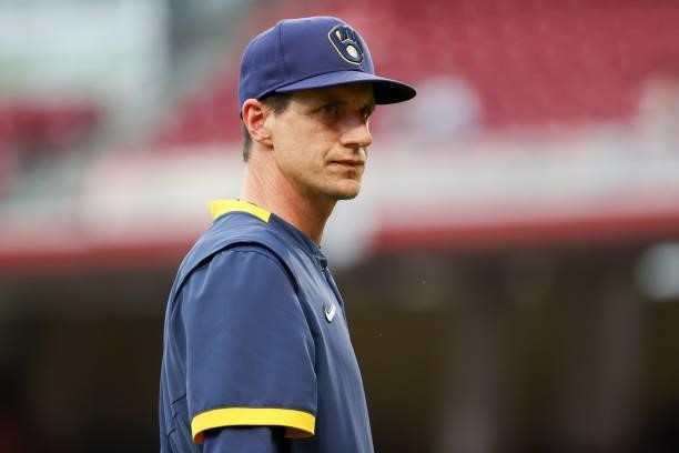 Manager Craig Counsell of the Milwaukee Brewers looks on in the second inning against the Cincinnati Reds at Great American Ball Park on June 09,...