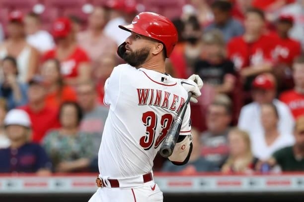 Jesse Winker of the Cincinnati Reds lines out in the second inning against the Milwaukee Brewers at Great American Ball Park on June 09, 2021 in...