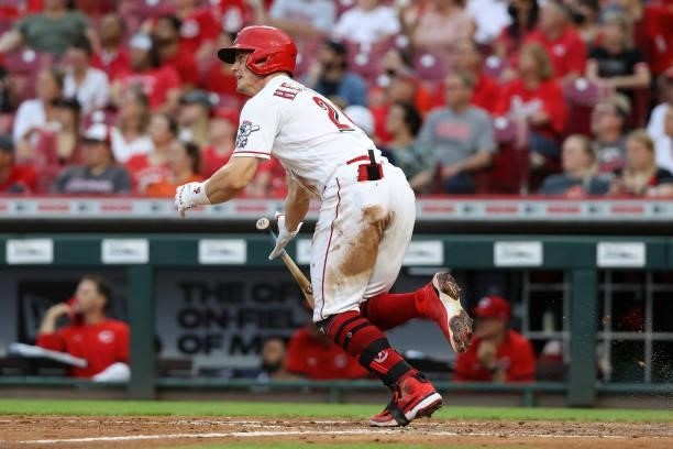 Scott Heineman of the Cincinnati Reds flies out in the third inning against the Milwaukee Brewers at Great American Ball Park on June 09, 2021 in...