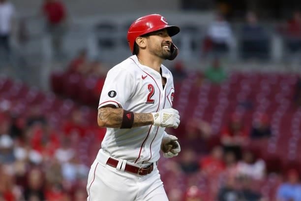 Nick Castellanos of the Cincinnati Reds reacts after drawing a walk in the fourth inning against the Milwaukee Brewers at Great American Ball Park on...