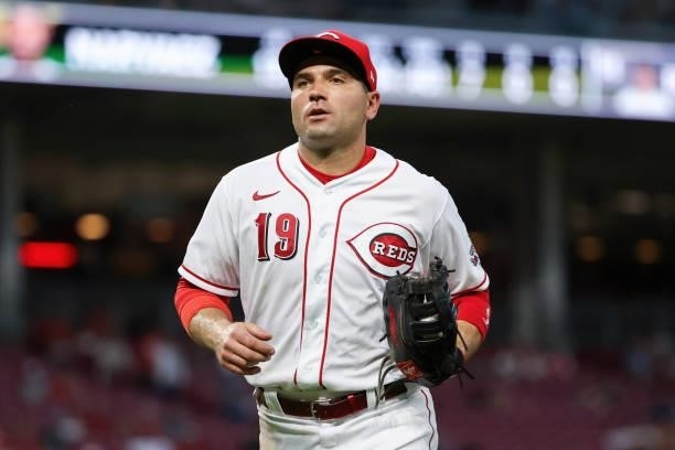 Joey Votto of the Cincinnati Reds jogs across the field in the fifth inning against the Milwaukee Brewers at Great American Ball Park on June 09,...