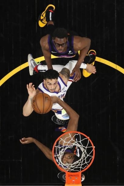 Markus Howard of the Denver Nuggets puts up a shot against E'Twaun Moore and Jalen Smith of the Phoenix Suns during the second half in Game Two of...