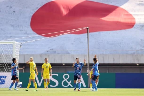 Yuzuho Shiokoshi of Japan celebrates scoring her side's fourth goal with her team mate Emi Nakajima during the women's international friendly match...