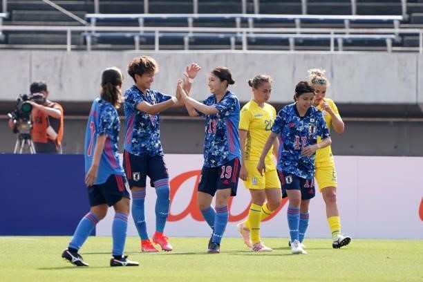 Yuzuho Shiokoshi of Japan celebrates scoring her side's fourth goal with her team mate Yuika Sugasawa during the women's international friendly match...
