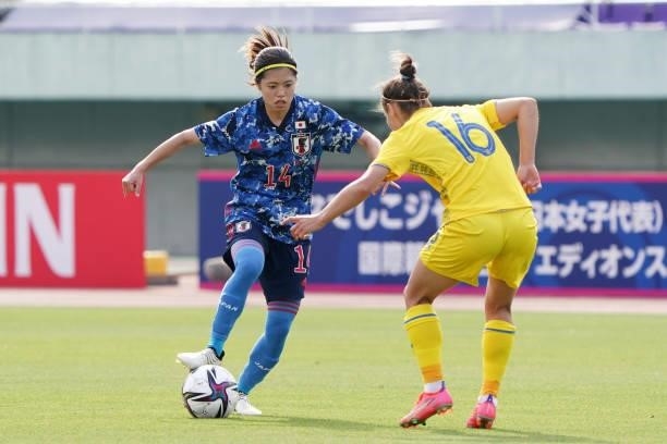 Yui Hasegawa of Japan takes on Olha Ovdiychuk of Ukraine during the women's international friendly match between Japan and Ukraine at Edion Stadium...