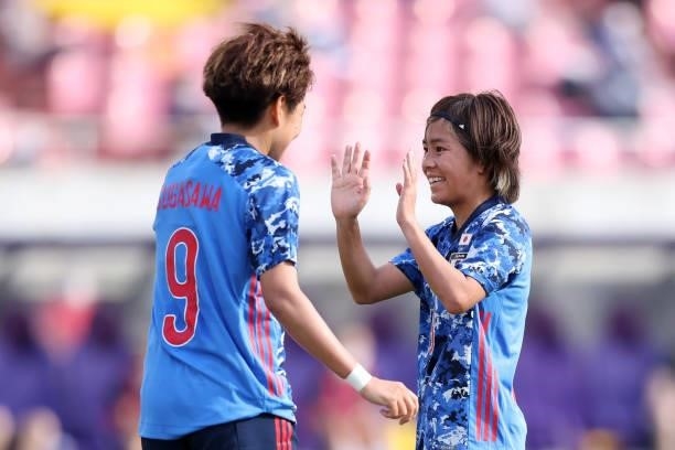 Mana Iwabuchi of Japan celebrates scoring her side's fifth goal with her team mate Yuika Sugasawa during the women's international friendly match...