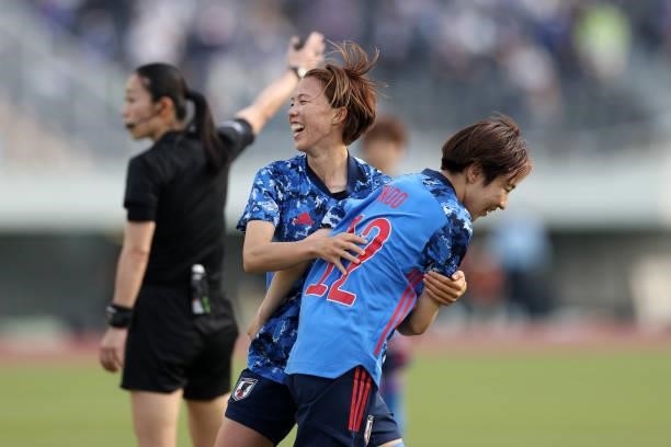 Hina Sugita of Japan celebrates scoring her side's sixth goal with her team mate Jun Endo during the women's international friendly match between...