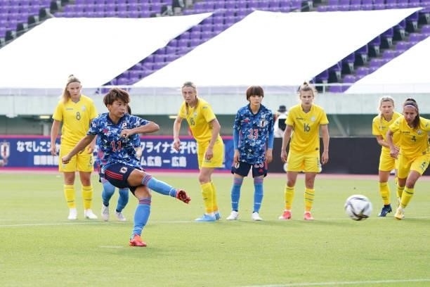 Mina Tanaka of Japan converts the penalty to score her side's seventh goal during the women's international friendly match between Japan and Ukraine...