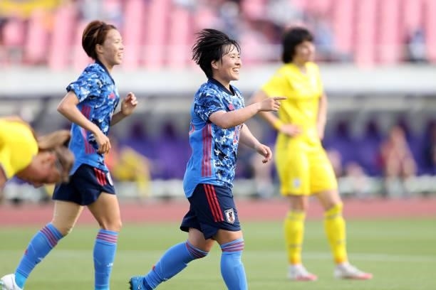 Yuka Momiki of Japan celebrates scoring her side's eighth goal during the women's international friendly match between Japan and Ukraine at Edion...