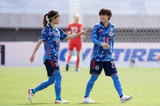 Yui Hasegawa and Nanami Kitamura of Japan talk during the women's international friendly match between Japan and Ukraine at Edion Stadium Hiroshima...