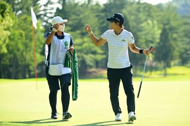 Lala Anai of Japan celebrates the eagle with her caddie on the 17th green during the first round of the Ai Miyazato Suntory Ladies Open at Rokko...