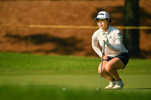 Sakura Koiwai of Japan lines up a putt on the 17th green during the first round of the Ai Miyazato Suntory Ladies Open at Rokko Kokusai Golf Club on...