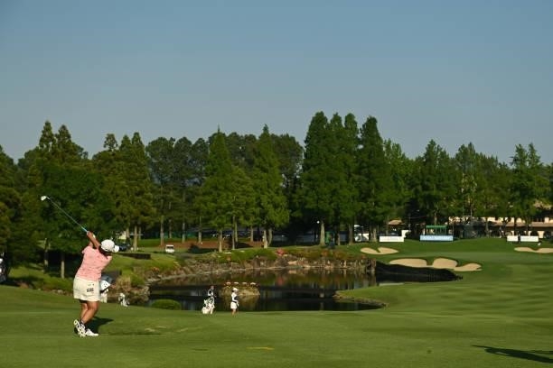 Ai Suzuki of Japan hits her second shot on the 18th hole during the first round of the Ai Miyazato Suntory Ladies Open at Rokko Kokusai Golf Club on...