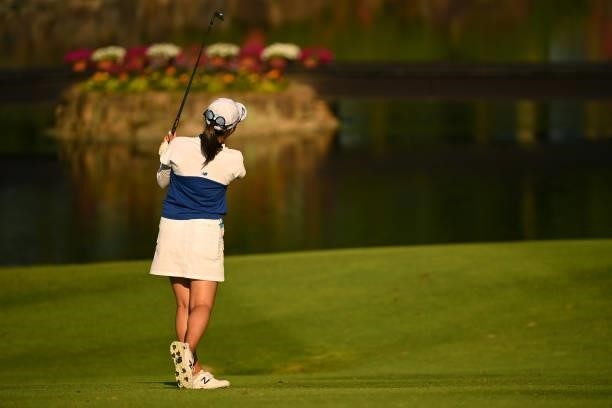 Mone Inami of Japan hits her third shot on the 18th hole during the first round of the Ai Miyazato Suntory Ladies Open at Rokko Kokusai Golf Club on...