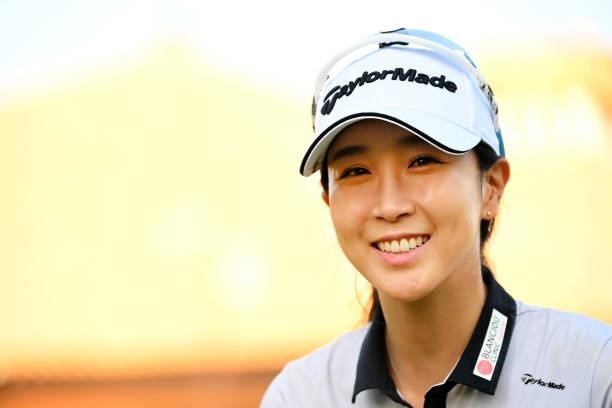 Jae-Eun Chung of South Korea poses as she made a hole-in-one at the 6th hole after the first round of the Ai Miyazato Suntory Ladies Open at Rokko...