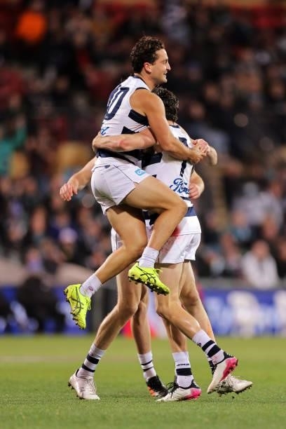 Luke Dahlhaus of the Cats and Isaac Smith of the Cats celebrate during the round 13 AFL match between the Port Adelaide Power and the Geelong Cats at...