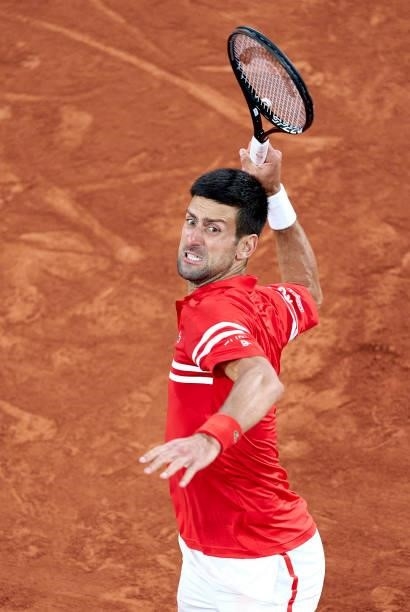 Novak Djokovic of Serbia reacts in his Quarter Final match against Matteo Berrettini of Italy during day eleven of the 2021 French Open at Roland...