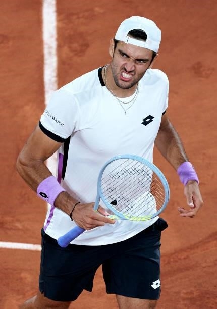 Matteo Berrettini of Italy reacts in his Quarter Final match against Novak Djokovic of Serbia during day eleven of the 2021 French Open at Roland...