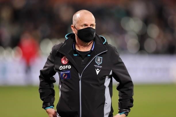 Ken Hinkley, Senior Coach of the Power walks from the ground during the round 13 AFL match between the Port Adelaide Power and the Geelong Cats at...
