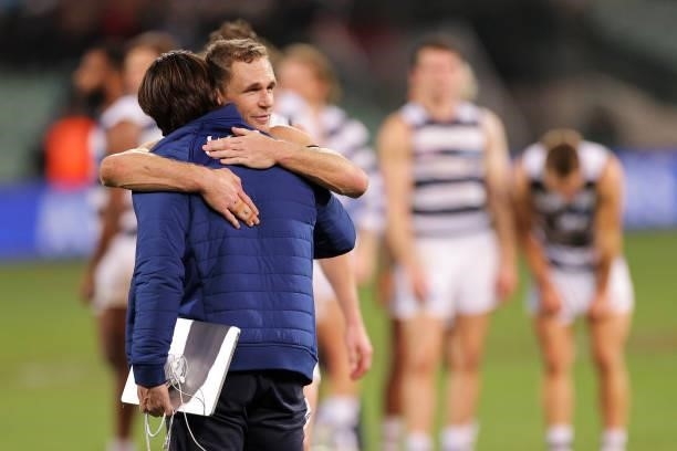 Chris Scott, head coach of the Cats hugs Joel Selwood of the Cats during the round 13 AFL match between the Port Adelaide Power and the Geelong Cats...