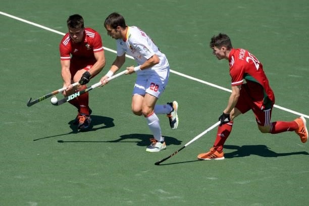 Ioan Wall of Wales, Marc Miralles of Spain and Jolyon Morgan of Wales during the Euro Hockey Championships match between Spain and Wales at Wagener...