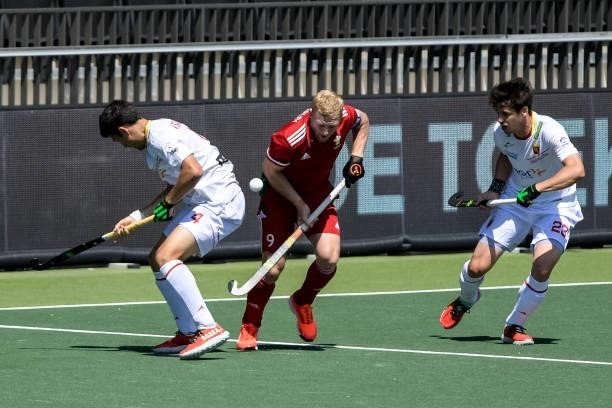 Ricardo Sanchez of Spain, Rupert Shipperley of Wales and Josep Romeu of Spain during the Euro Hockey Championships match between Spain and Wales at...