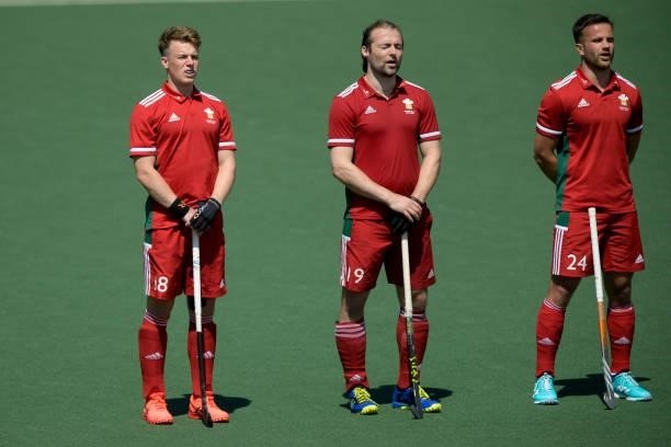 Gareth Furlong of Wales, Owain Dolan-Gray of Wales and Hywel Jones of Wales line up for the National Anthem during the Euro Hockey Championships...