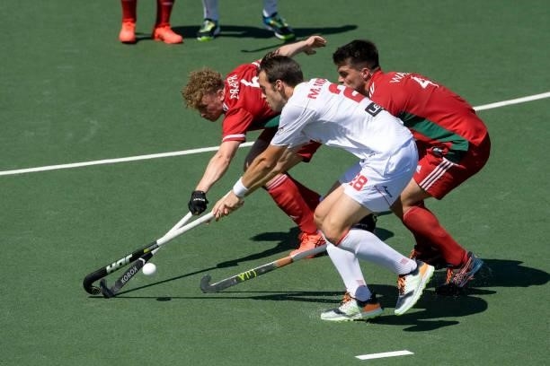 Jacob Draper of Wales, Marc Miralles of Spain and Ioan Wall of Wales during the Euro Hockey Championships match between Spain and Wales at Wagener...