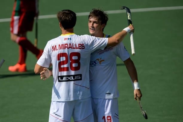 Marc Miralles of Spain celebrates with Jose Basterra of Spain after scoring his sides sixth goal during the Euro Hockey Championships match between...
