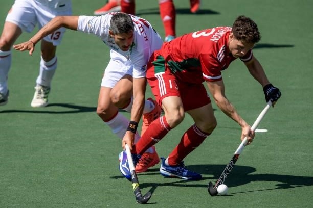 Xavi Lleonart of Spainn and Dale Hutchinson of Wales during the Euro Hockey Championships match between Spain and Wales at Wagener Stadion on June...