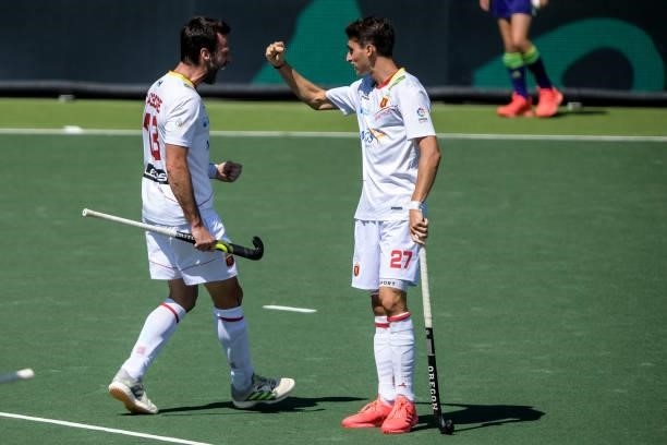 David Alegre of Spain celebrates with Marc Bolto of Spain after scoring his sides fourth goal during the Euro Hockey Championships match between...
