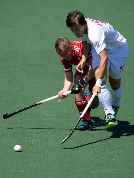 Rhodri Furlong of Wales and Jose Basterra of Spain battle for possession during the Euro Hockey Championships match between Spain and Wales at...