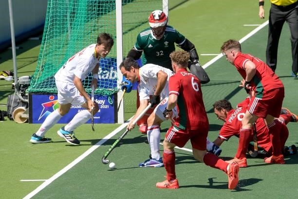 Jose Basterra of Spain, Ieuan Tranter of Wales, Alvaro Iglesias of Spain and Jacob Draper of Wales during the Euro Hockey Championships match between...