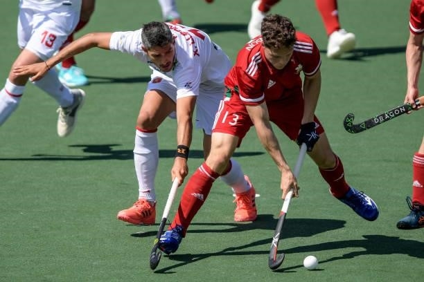 Xavi Lleonart of Spainn and Dale Hutchinson of Wales during the Euro Hockey Championships match between Spain and Wales at Wagener Stadion on June...