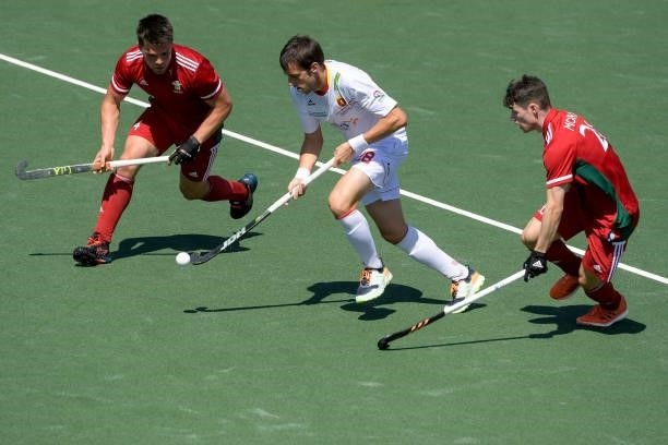 Ioan Wall of Wales, Marc Miralles of Spain and Jolyon Morgan of Wales during the Euro Hockey Championships match between Spain and Wales at Wagener...