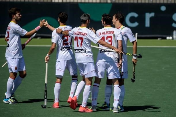 David Alegre of Spain celebrates with Jose Basterra of Spain after scoring his sides fourth goal during the Euro Hockey Championships match between...
