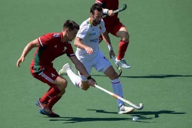 Ioan Wall of Wales and David Alegre of Spain battle for possession during the Euro Hockey Championships match between Spain and Wales at Wagener...