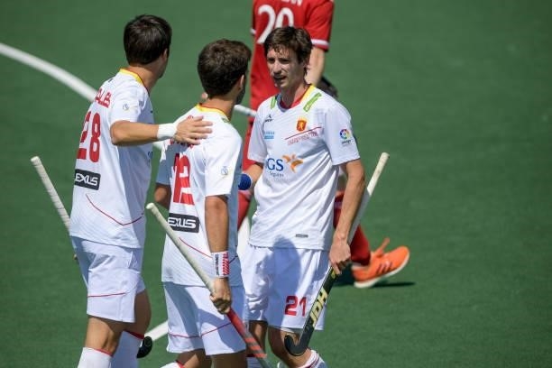 Joan Tarres of Spain celebrates with his team mates after scoring his sides first goal during the Euro Hockey Championships match between Spain and...