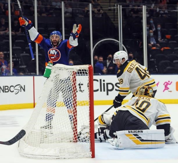 Kyle Palmieri of the New York Islanders scores at 16:07 of the second period against Tuukka Rask of the Boston Bruins in Game Six of the Second Round...