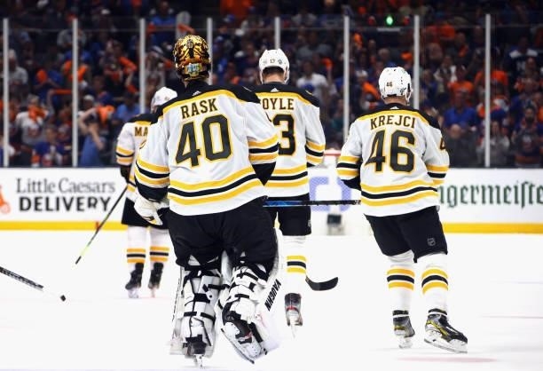 The Boston Bruins leave the ice following a defeat against the New York Islanders in Game Six of the Second Round of the 2021 NHL Stanley Cup...