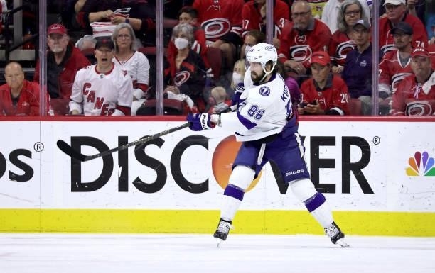 Nikita Kucherov of the Tampa Bay Lightning passes the puck in Game Five of the Second Round of the 2021 Stanley Cup Playoffs against the Carolina...