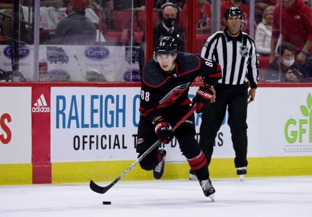 Martin Necas of the Carolina Hurricanes skate with the puck in Game Five of the Second Round of the 2021 Stanley Cup Playoffs against the Tampa Bay...